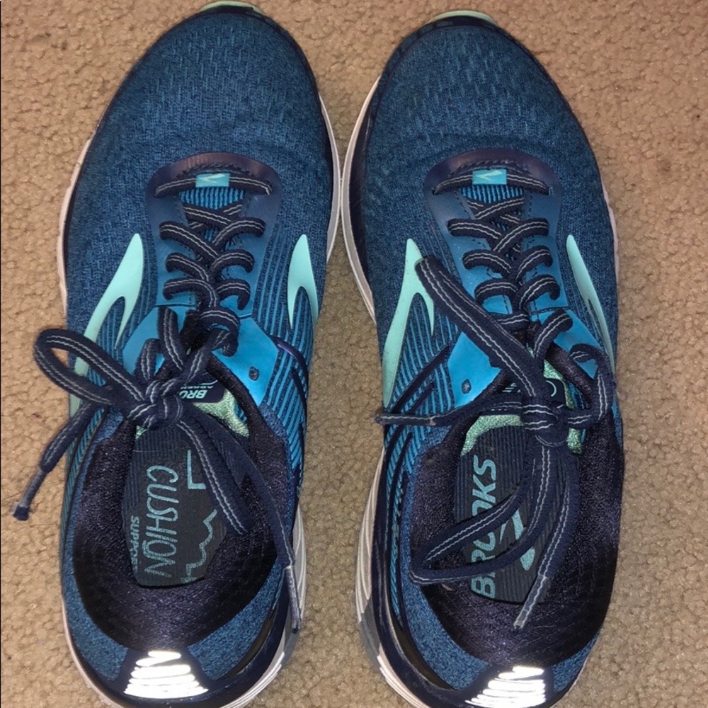 blue running brooks sneakers